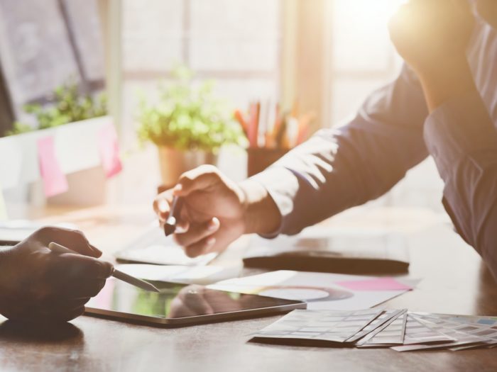 photo-of-people-pointing-on-tablet-3734626