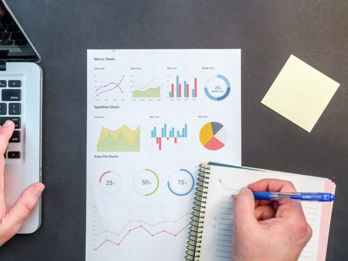 person-writing-on-notebook-669615